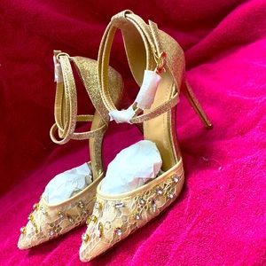 Brand new pair of beige Gisselle Strappy heals
